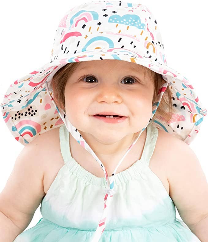 Infant and toddler bucket hat with rainbows and clouds pattern, sun protection hat for kids