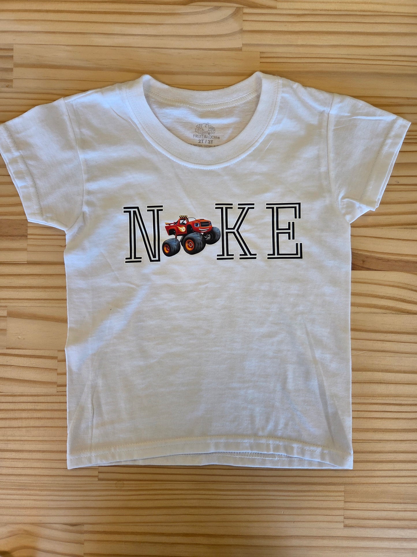 White toddler t-shirt with bold Blaze graphic design, unisex kids tee for boys and girls