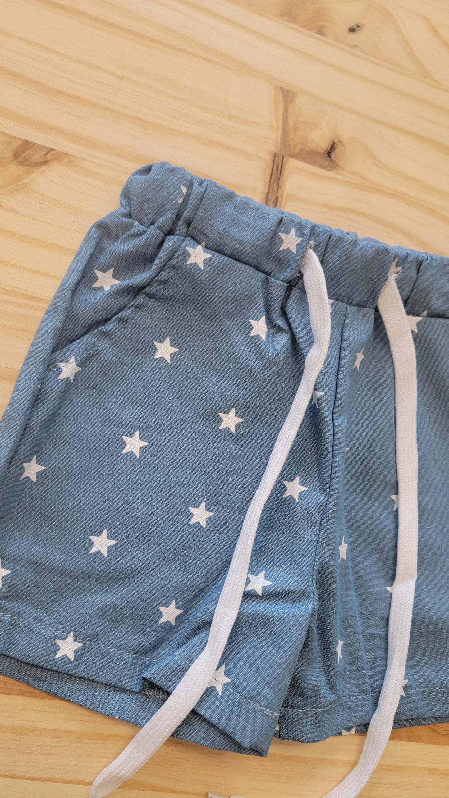Close-up of kids’ star shorts fabric – breathable patriotic summer shorts for Independence Day