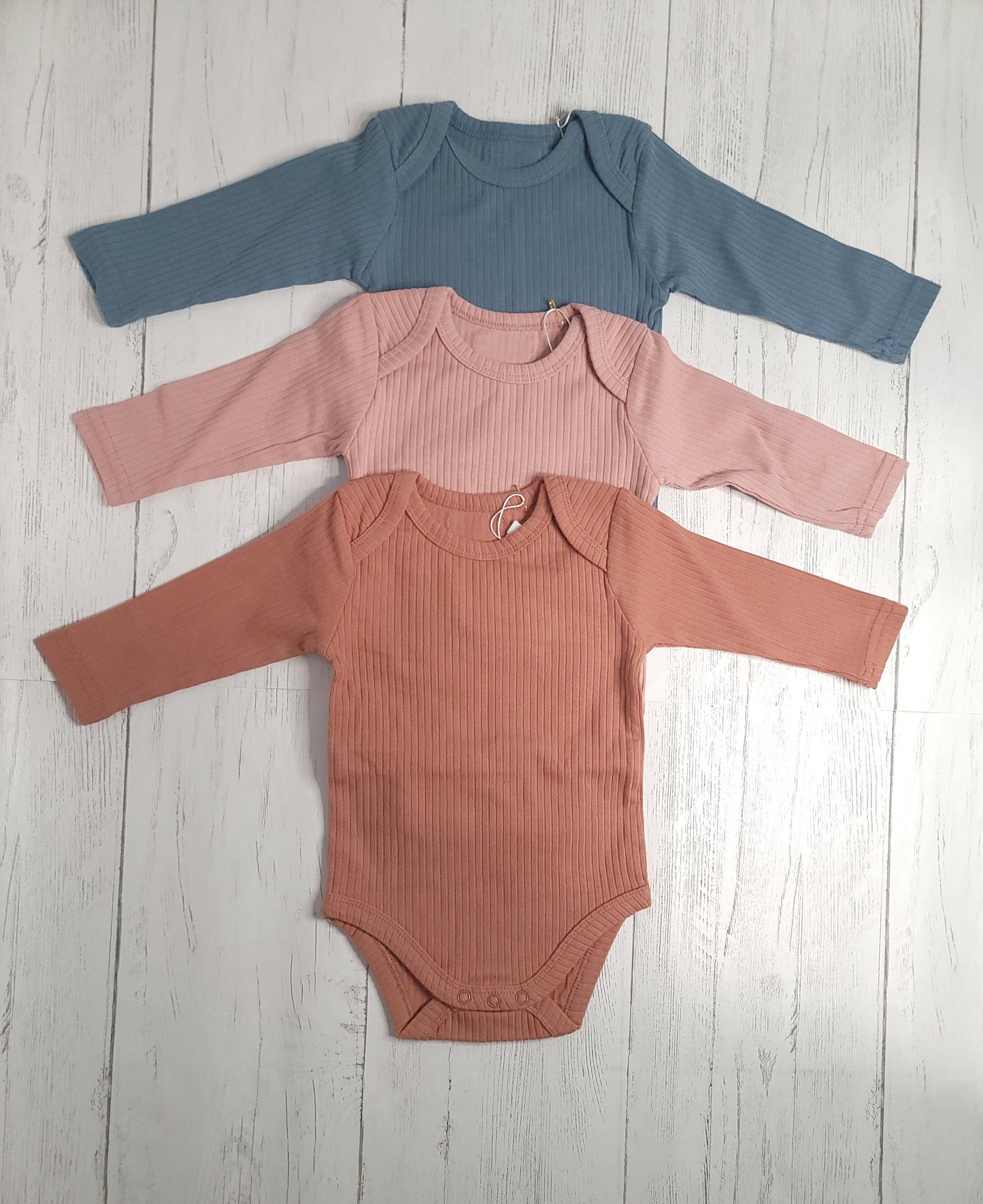 Organic Cotton Long Sleeve Ribbed Baby Onesie – Blue, Clay, & Rust Pink