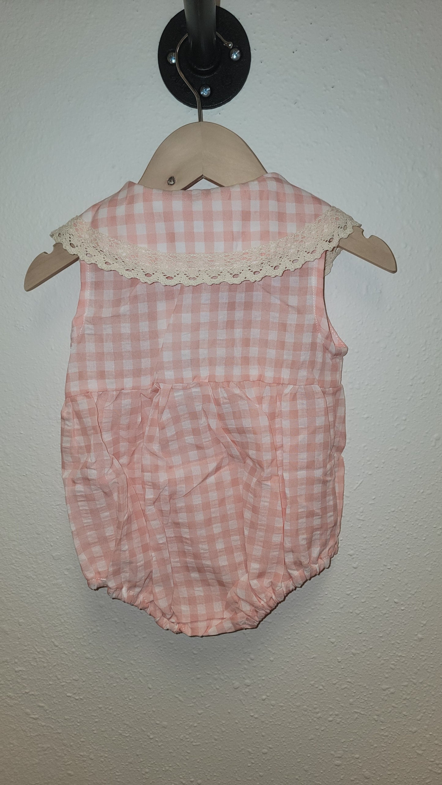 Classic plaid button-up romper in pink – baby girl outfit with ruffle details