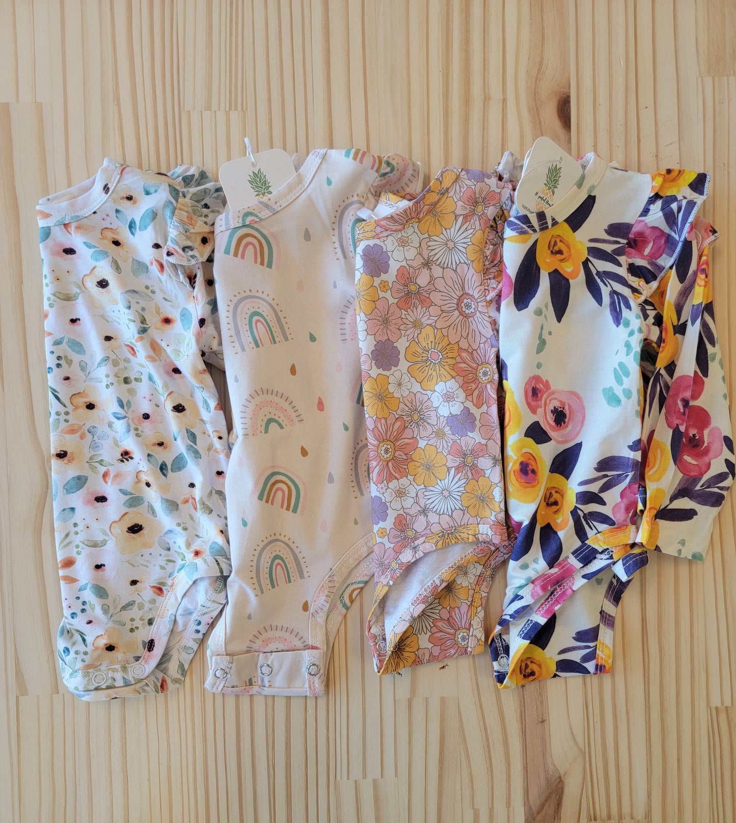 Eco-friendly bamboo baby bodysuit, floral print, soft and breathable for newborns