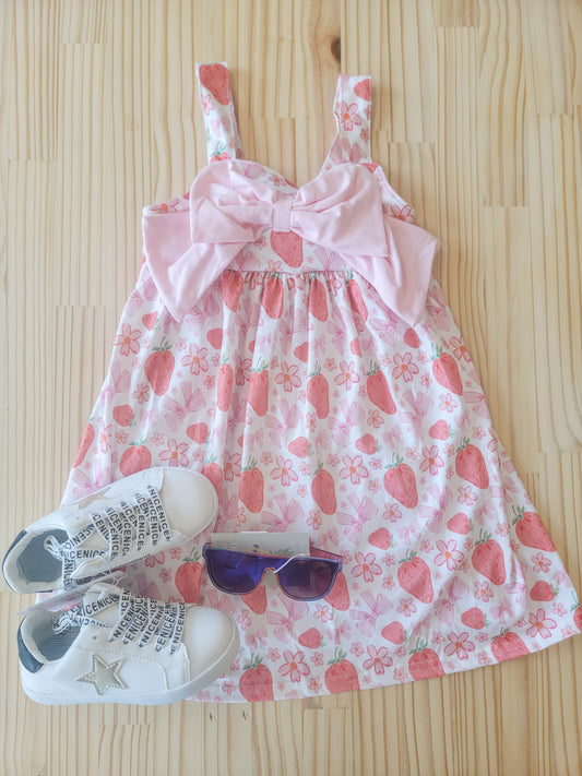 Youth summer dress with strawberry print and pink bow, cute and comfortable warm-weather outfit for girls