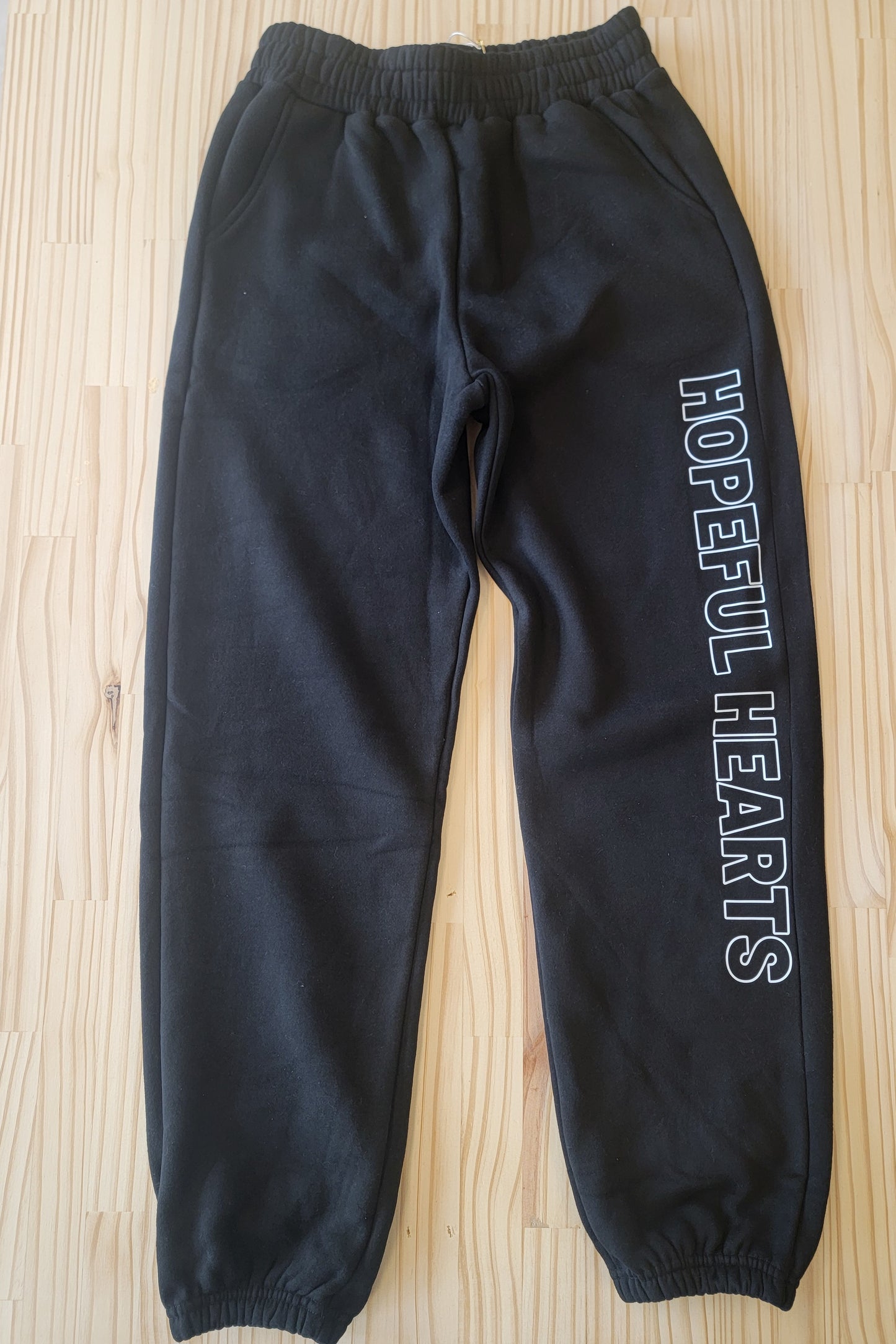 Ultra-soft Hopeful Hearts jogger sweatpants, cozy fleece loungewear for casual and home wear black