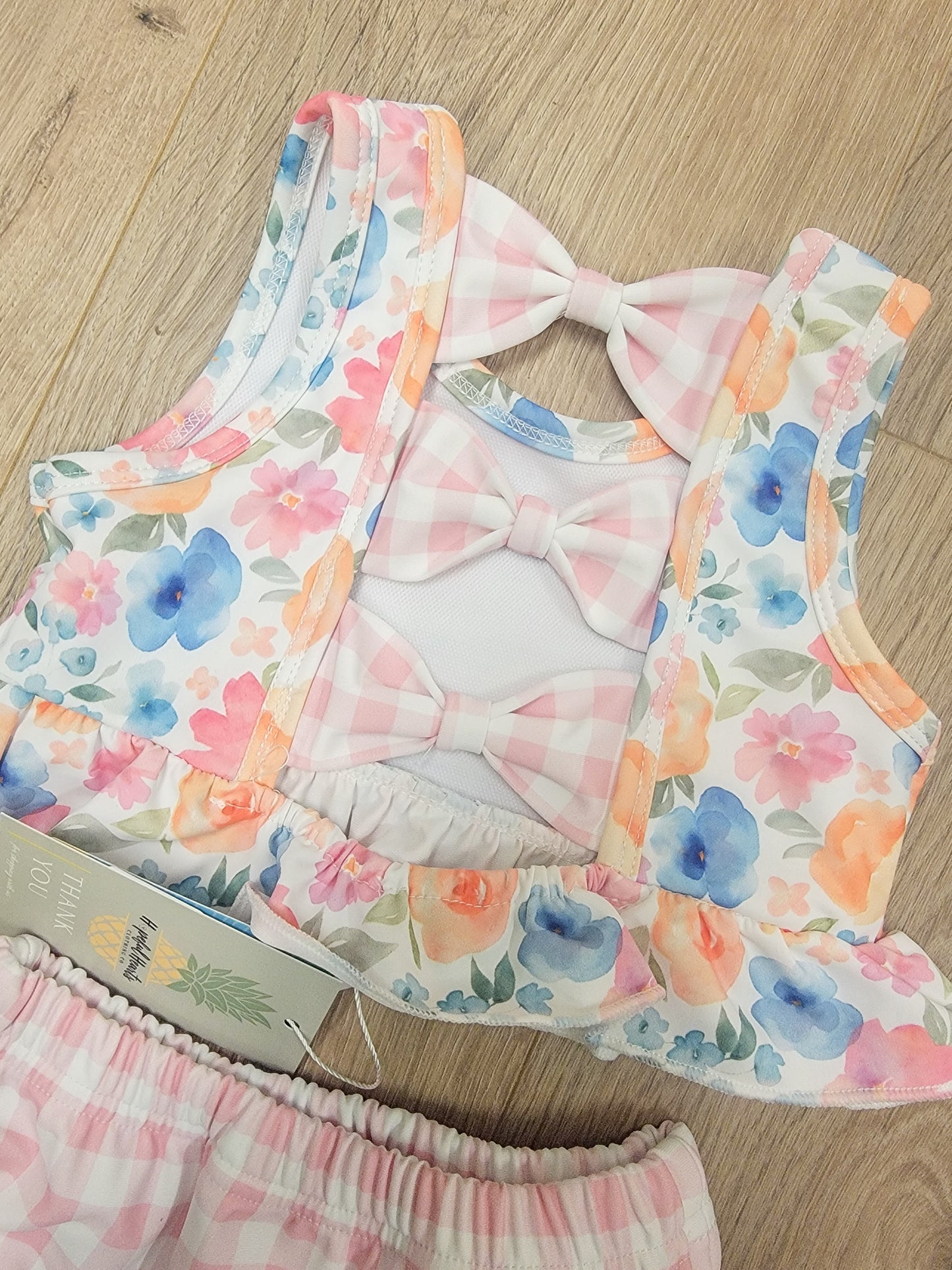 Watercolor floral 2-piece swimsuit for girls, stylish ruffle design with UV protection for beach and pool