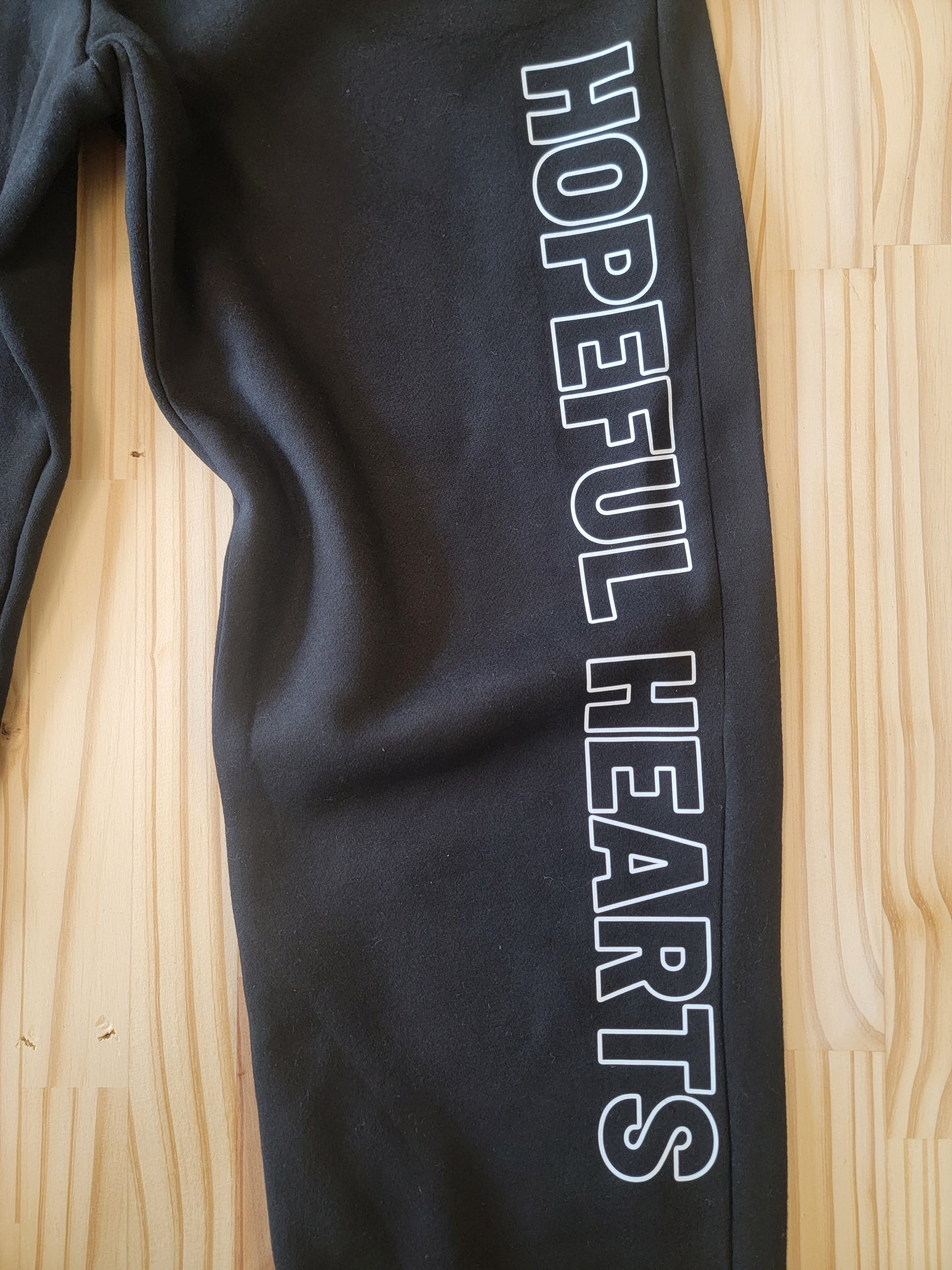 Women’s fleece jogger pants in soft fabric, comfortable relaxed fit loungewear from Hopeful Hearts zoom in on text