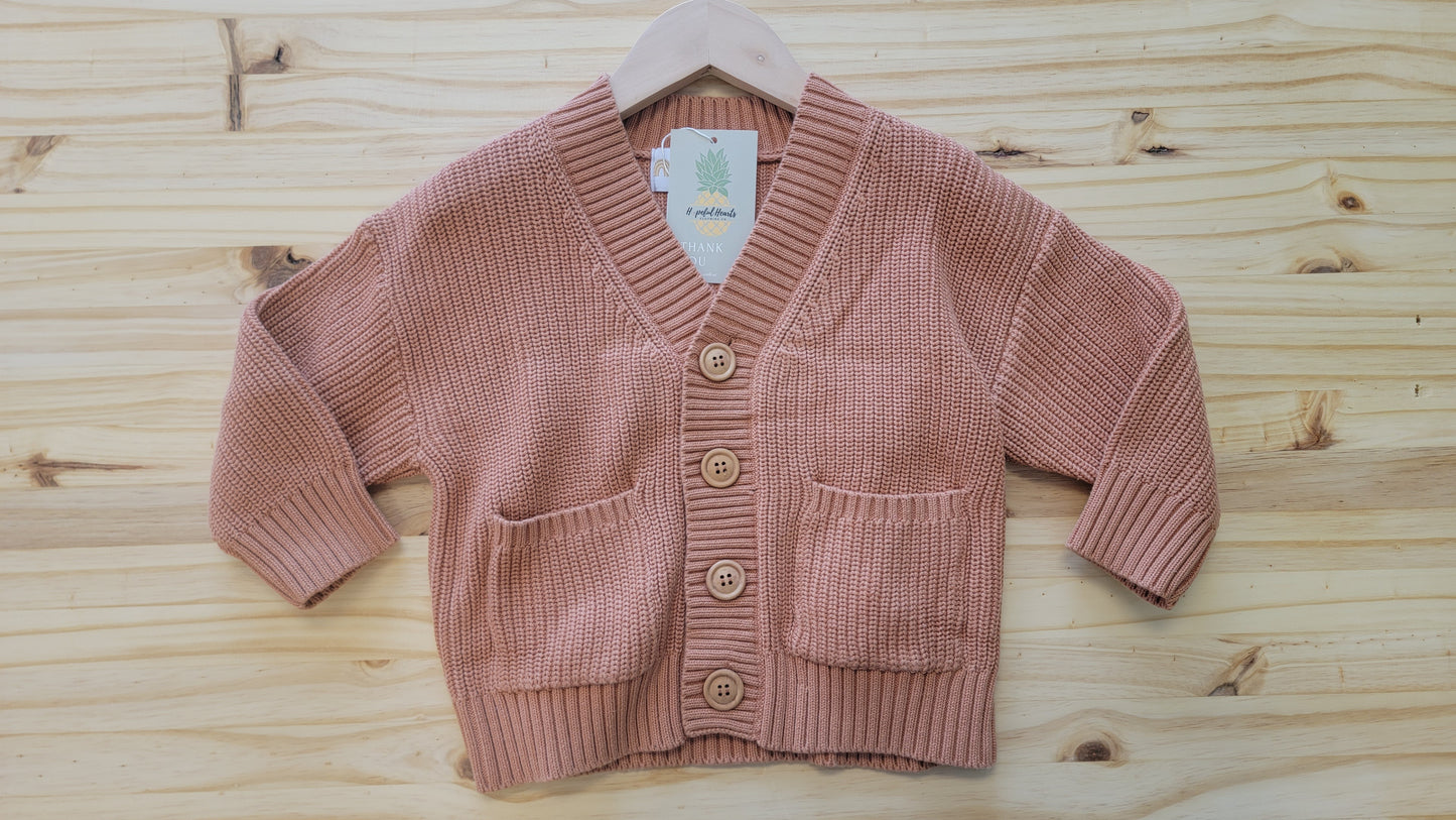 Warm and stylish children’s cardigan, versatile cold weather layer for kids peach