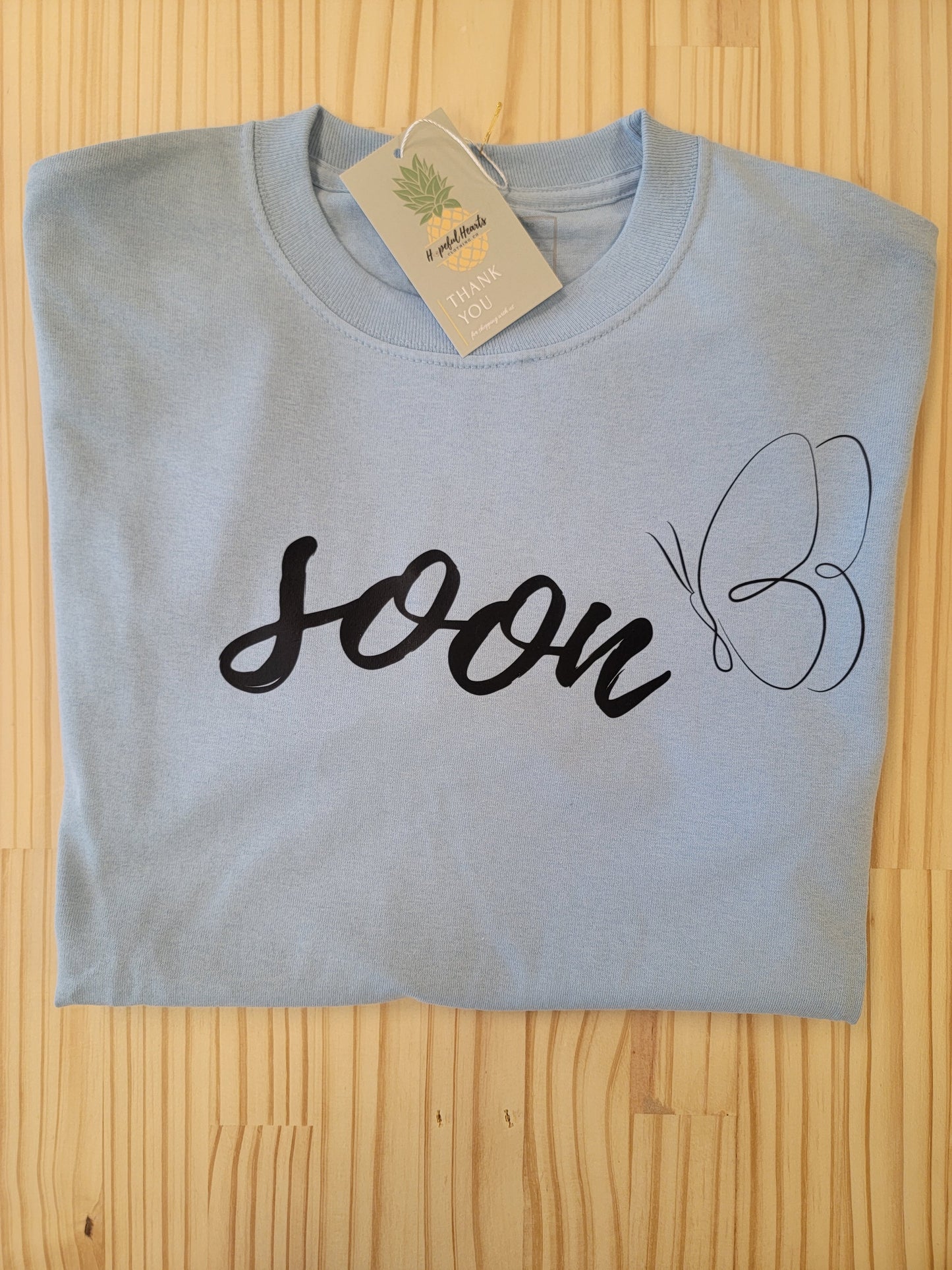 close up ‘Soon’ butterfly t-shirt supporting infertility and mental health awareness”