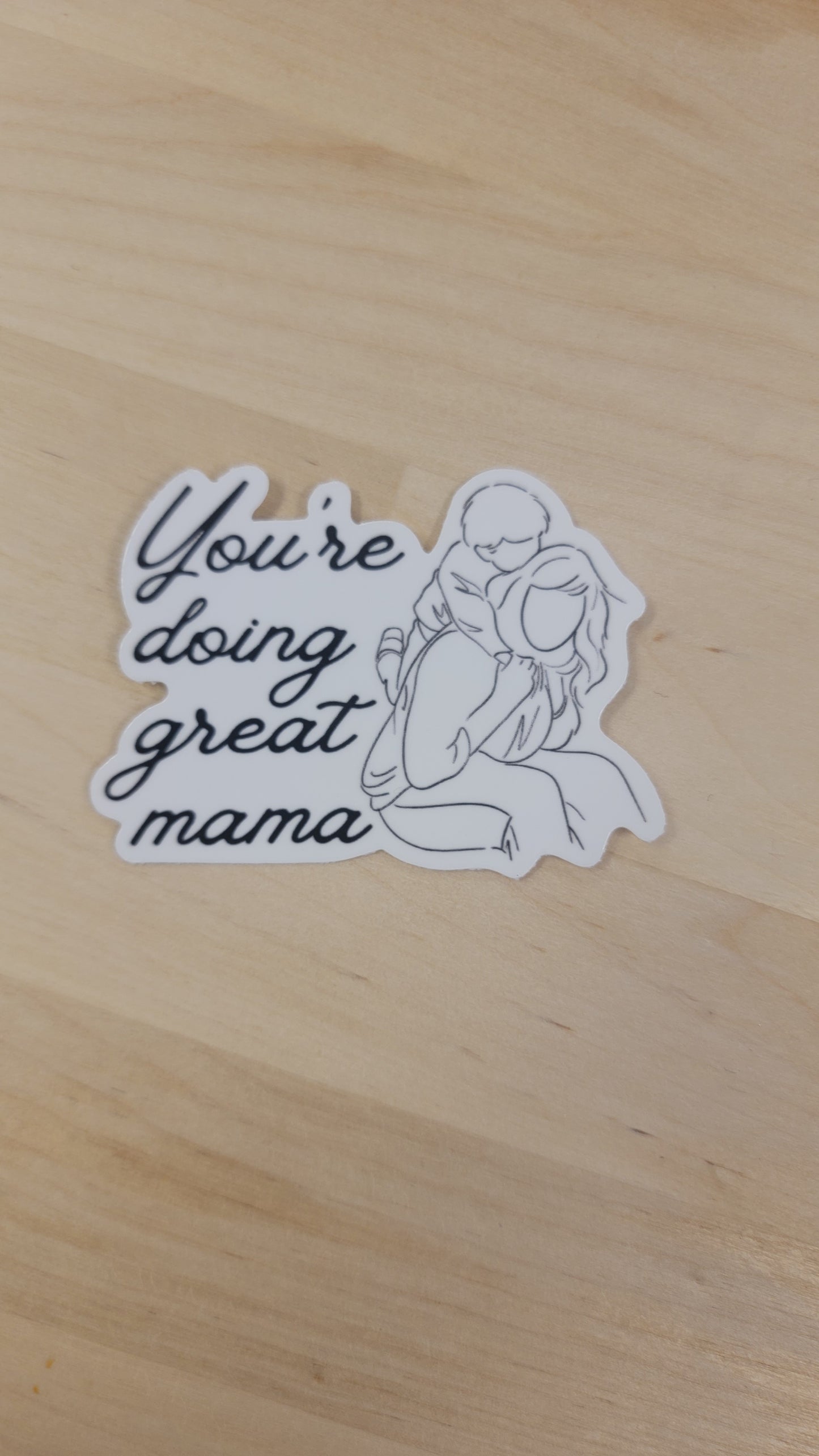 You’re Doing Great Mama waterproof sticker for moms, Bombproof™ material, offering encouragement and positivity, perfect for laptops, water bottles, or notebooks