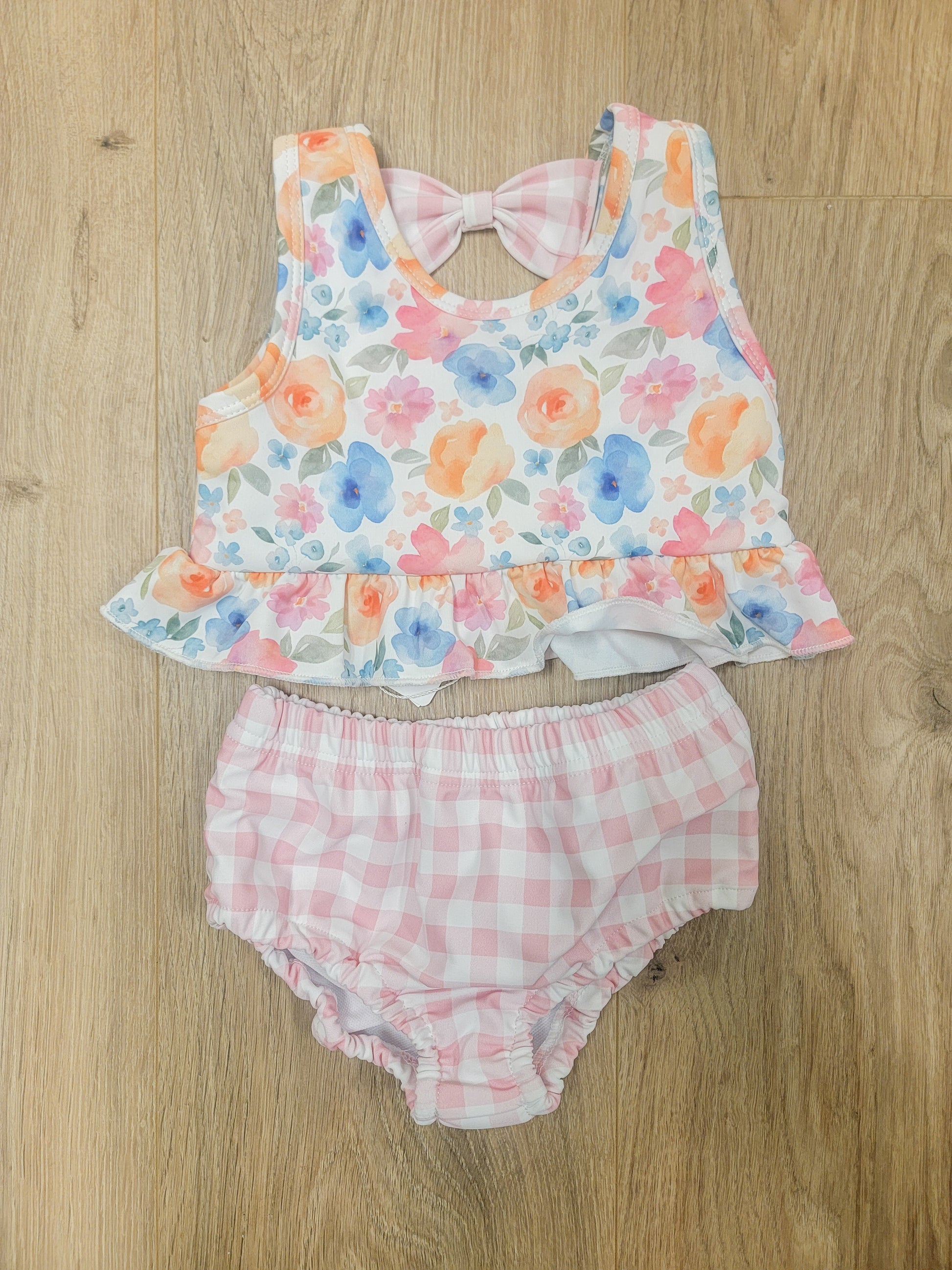 Girls’ 2-piece swimsuit with watercolor floral print and ruffle details, UPF 50+ sun protection swimwear