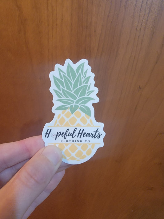 Hopeful Hearts logo sticker featuring pineapple emblem, symbolizing hope, positivity, and support for infertility awareness