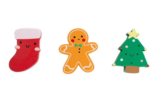Christmas 3-Piece Wooden Holiday Puzzle with stocking, gingerbread man, and Christmas tree pieces removed from wooden board
