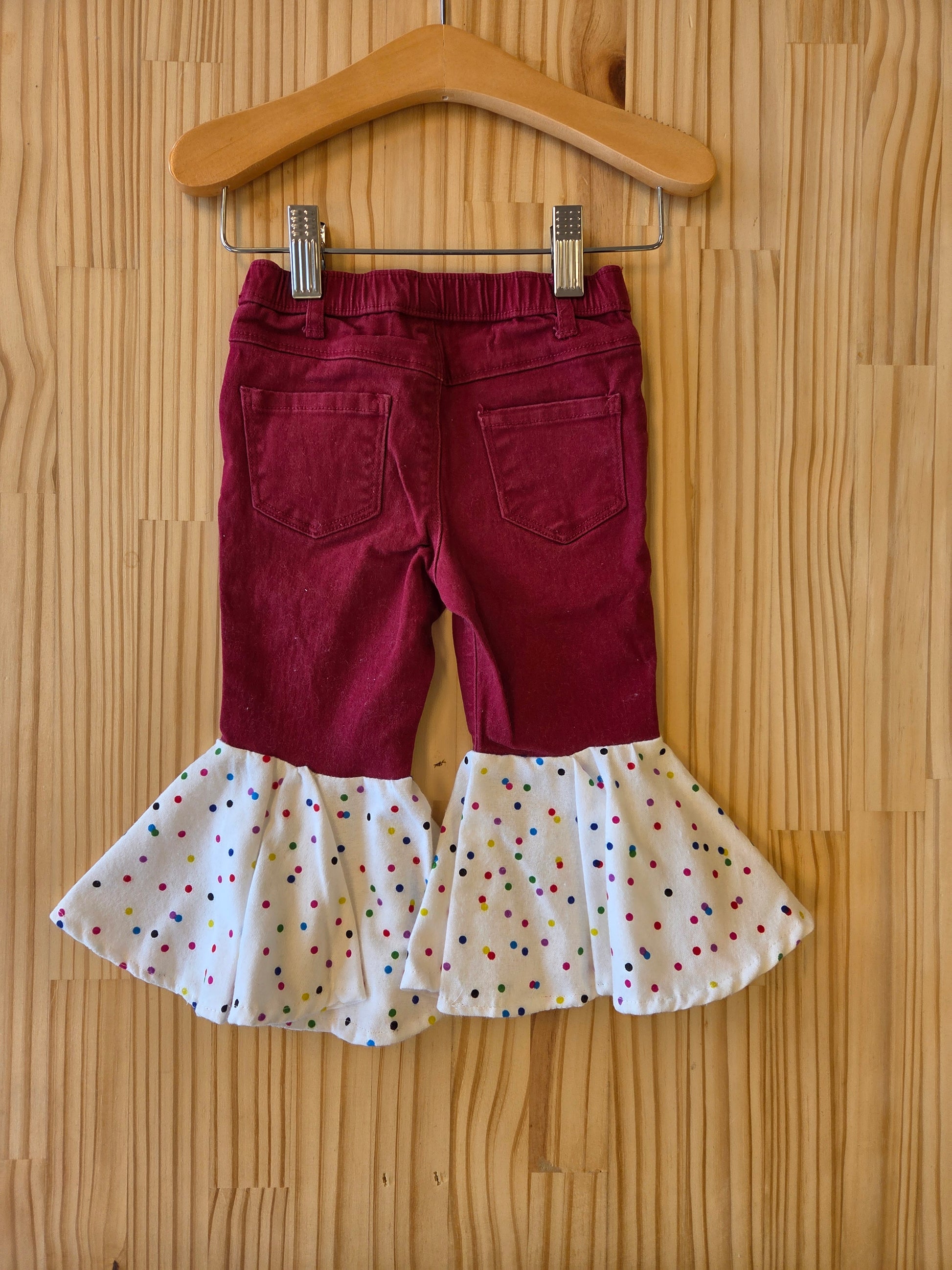 Back side of re-purposed baby bell bottoms with stretchy waistband